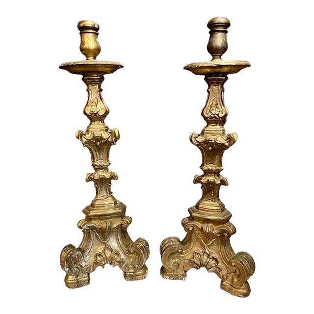 Pair of Carved and Parcel Gilt Altar Sticks For Sale