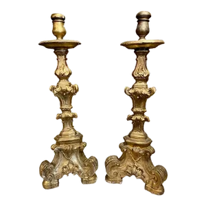 Pair of Carved and Parcel Gilt Altar Sticks