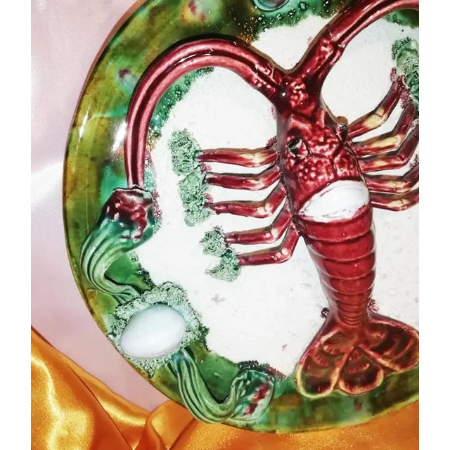Pair of Majolica wall ornaments in the shape of a plate with figures of lobster and crab with other small shells Perfect...