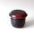 This is a vintage studio pottery jar. Signed by the artist, the handmade jar features a charcoal and raspberry glaze. Its...