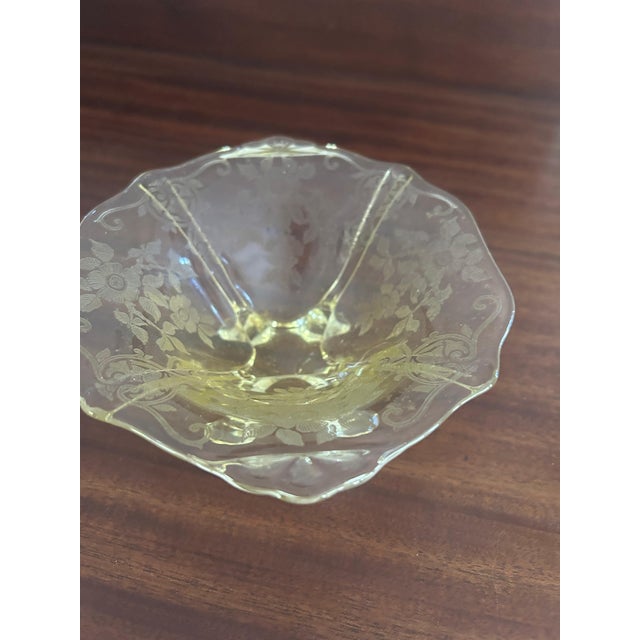 Elegant Cambridge Glass footed candy dish in Vaseline yellow, featuring an etched Apple Blossom pattern from the 1930s....