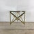 Elevate your space with the timeless elegance of this vintage-style brass and glass side table, inspired by the iconic...