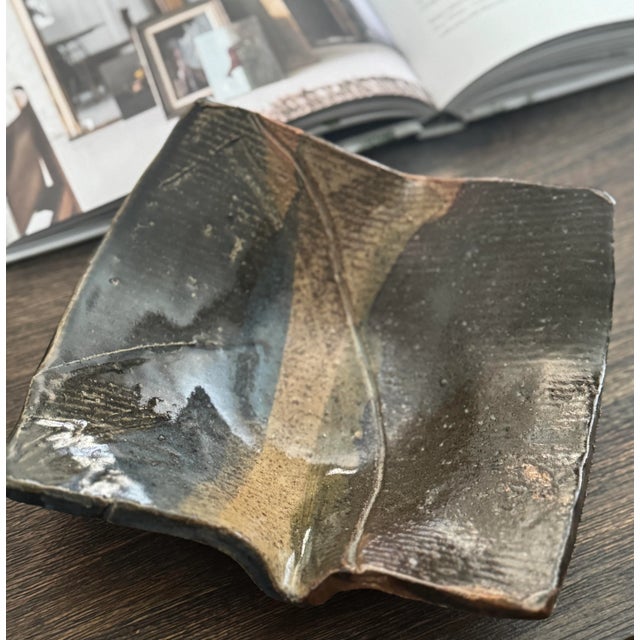 Beautifully signed studio pottery bowl, hand-thrown in sculptural form with a substantial, weighted feel. Rich caramel and...