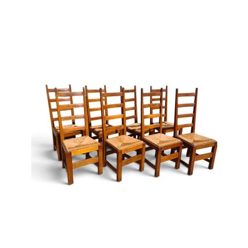 Specifications This set of eight Arts and Crafts dining chairs features a classic high nack ladder-back design. The chairs...