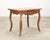 A charming 18th century French Louis XV walnut writing desk or side table made in the provincial taste. The distinctive...