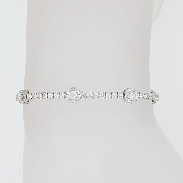 Gorgeous 3.04 ct. white diamond round cluster links handmade in 14k white gold. Length of bracelet is 7.25. Metal: White...