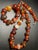 The necklace had larger beads Black grass agate (also known as ‘hei cao’) a rare variety of Nanhong (Southern Red) agate...