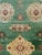 An antique Indian Agra carpet with a weathered appeal from the early 20th century. In the Persian Sultanabad-Mahal style,...