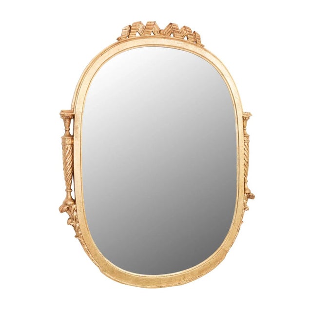 Gold Gilt Shield Mirror in the Hollywood Regency Style. Circa 1930's Original mirror and backing with wire for hanging....