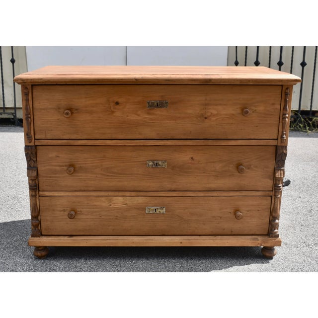 The top of this large chest of three hand-cut dovetailed drawers has a shallow step-down edge complemented with the...