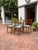 A striking set of five mid-century Polish dining chairs crafted from solid beech with gracefully sculpted ladder-back...