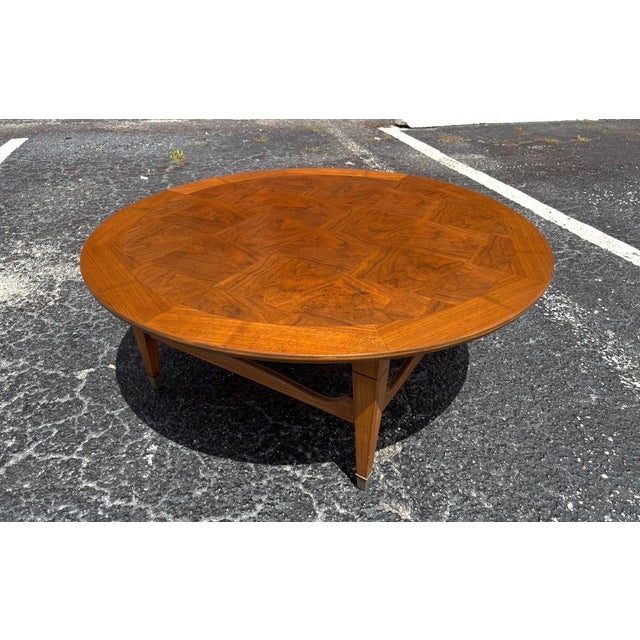 A beautiful parquetry top mid century coffee table in fully-refinished condition. Sanded, stained, and sealed for another...