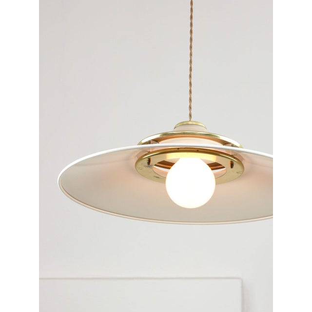 Lamp's cover is made of genuine brass material complementing this vintage item nicely with it's golden colour.i total...