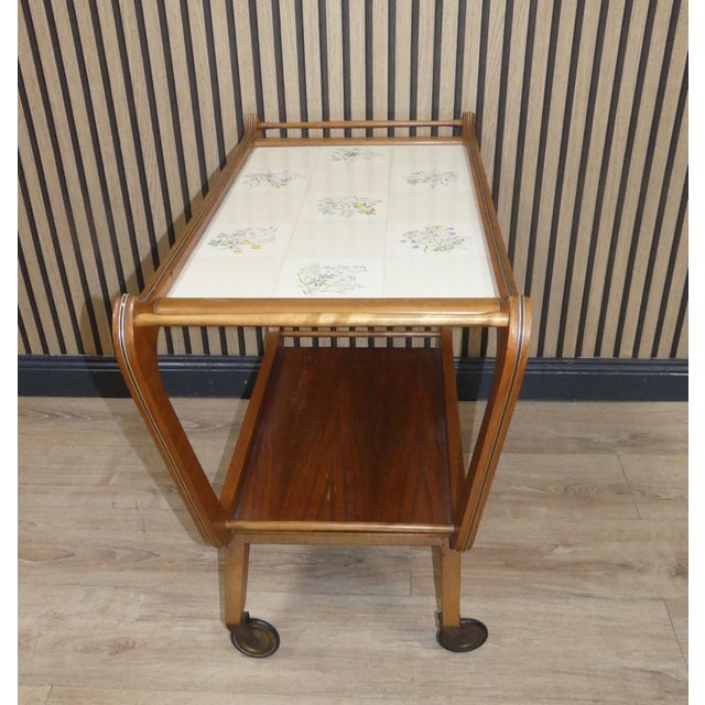 Sensationally elegant tea trolley double-story rollable 50s/60s light wood Upper plate Formica in a tile look with a...