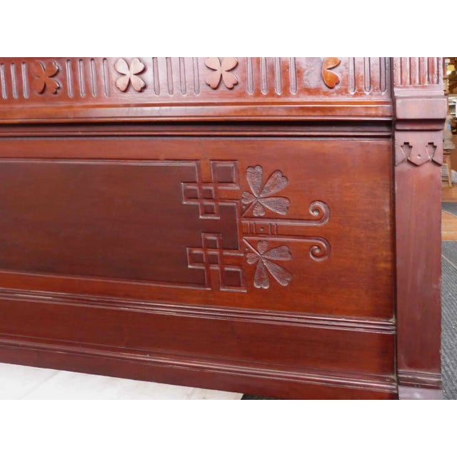 Late 19th century Aesthetic Movement mahogany double bed frame. The mahogany has a patina. The footboard height is 30 inches.
