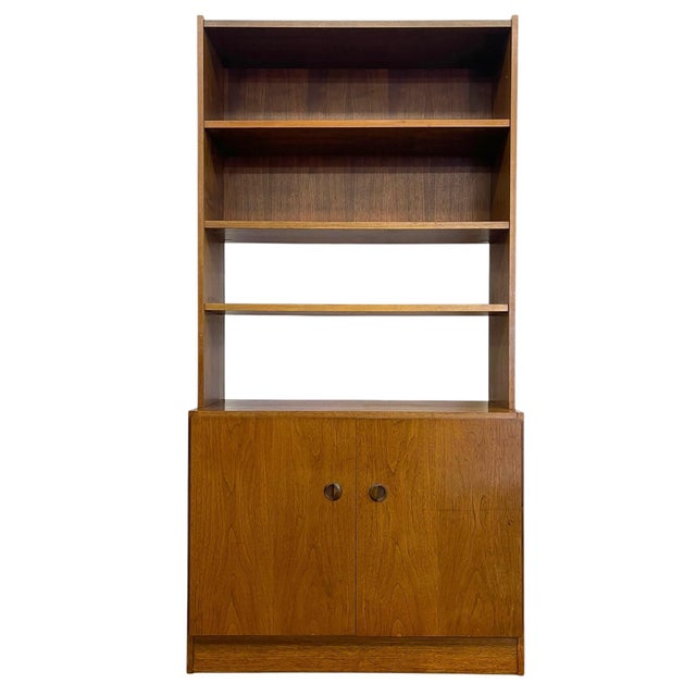 Vintage mid century modern cabinet and bookcase unit manufactured by Van Pelt in Belgium. This two-piece storage and...
