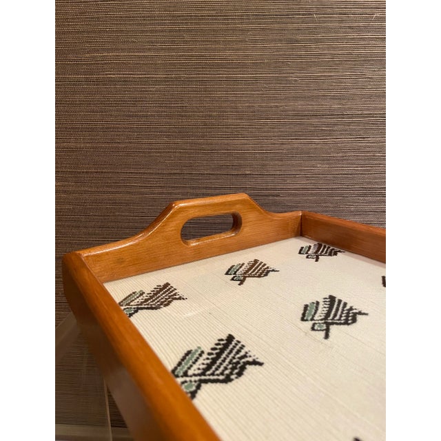 Newly made Carved wooden tray with a vintage handwoven Guatemalan textile from the 1980's. Set under glass, the tray is...