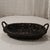 Vintage large oval natural woven black wicker serving tray with handles. This luxurious wicker serving tray adds a touch...