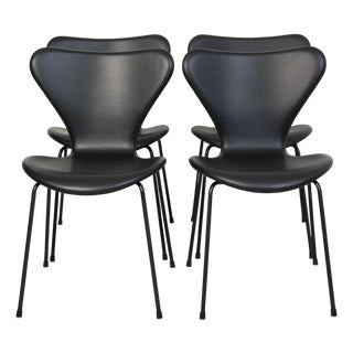 Seven Chairs in Black Leather with Black Frames by Arne Jacobsen, 1990s, Set of 4 For Sale