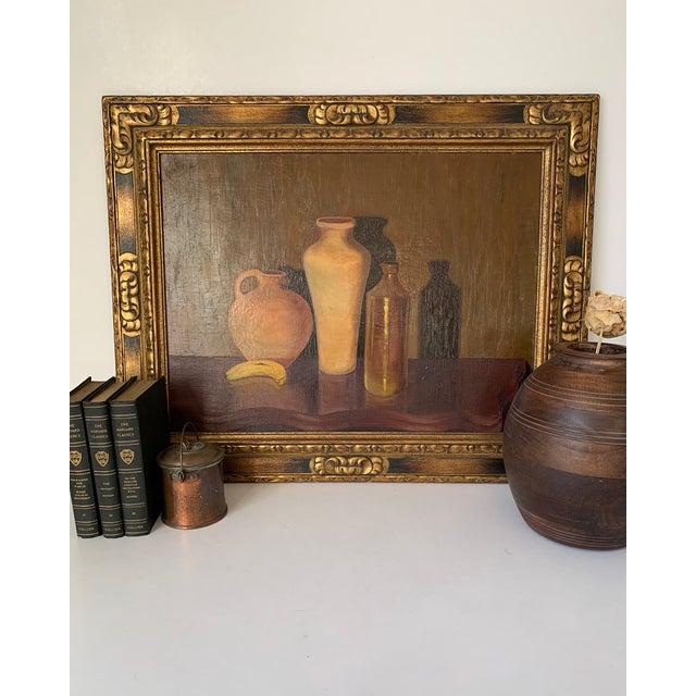 1930's Original Oil on Board Still Life with Three Vessels by Artist John Newton A beautiful interior scene depicting...