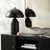 Illuminate your space with the Elder accent table lamp, a striking blend of industrial rustic charm that will captivate...