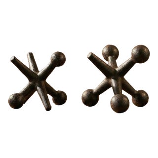 Pair of Oversized Cast Iron Decorative Jacks For Sale