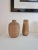 A set with two vases, with a warm organic structure. Signed Ekeby designed by Greta Runeborg, Sweden mid-1900s. Smaller...