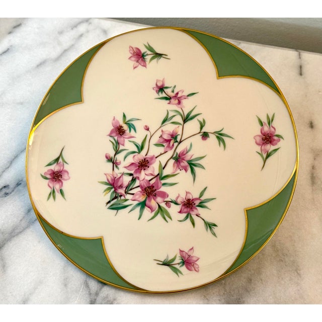 Lenox Peachtree Plate, part of the Peachtree china pattern produced from 1948 to 1968. Pattern: Pink flowers on branches....