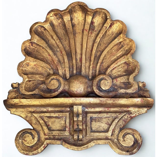 Presenting an exceptional Italian made shell motif Mid-Century table top sized easel with a gold tone gilt finish....