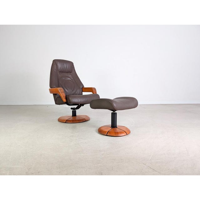 We are offering a beautiful teak armchair with ottoman by HS Furniture from the 1960s for sale. Condition: Good used...