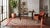 Elevate high-end interiors with this striking modern Southwest Navajo-style flat-weave wool rug. Featuring bold stepped-...