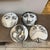 An exquisite and rare set of four vintage Tema e Variazioni black and white porcelain wall plates designed by Piero...