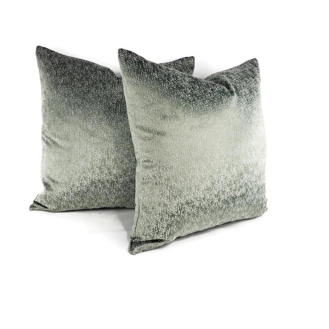 The Jane Churchill TWILIGHT pillow cover showcases a stunning ombre effect, transitioning from a deep charcoal at the top...