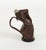 Midcentury amazing liqueur bottle in curved brown leather, glass and metal with handle. Made in Italy in the 1960s.