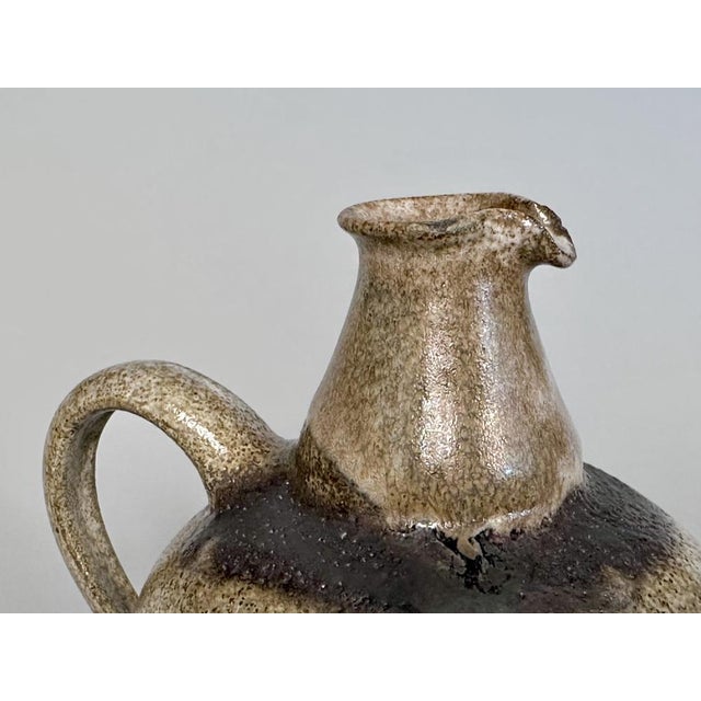 This high quality studio ceramic art jug vase was created by the renown German ceramic artist Helma Klett (1908-1996)...