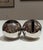 Award-winning NIO collection by Oliver Hemming. Polished 18/10 stainless steel sugar bowl and creamer featuring spherical...