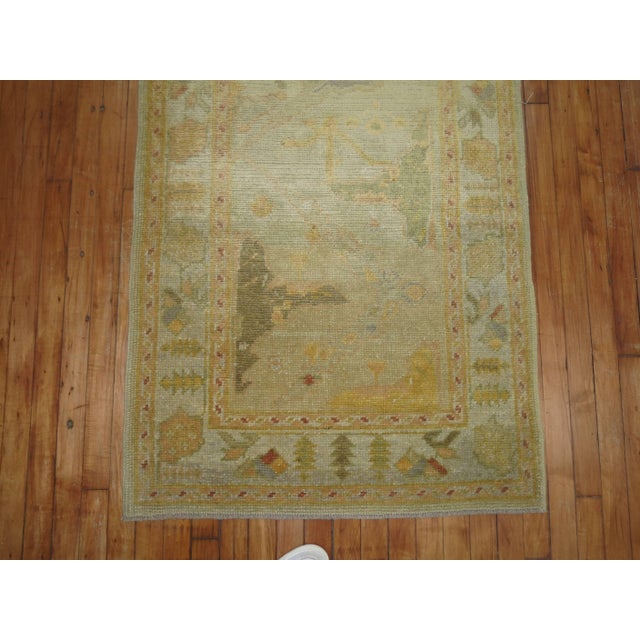 Turkish runner in warm colors with a geometric garrus design derived from late 19th century Persian Bidjar rugs. 3' x 14'7''