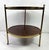 This is an elegant mid-century vintage Hollywood Regency style walnut and brass side table by Baker furniture. This table...