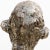 Nephiline and manganese glazed Buño clay head sculpture channels organic textures and existential introspection in...