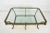 Hollywood Regency 1970s Oversized Hollywood Regency Gilt Iron Two-Tier Glass Coffee Table For Sale - Image 3 of 13