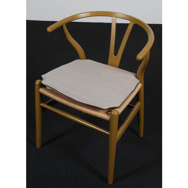 Hans J. Wegner cushions for wishbone chair model CH24. Made in canvas with leather tubing and good quality foam. Only the...