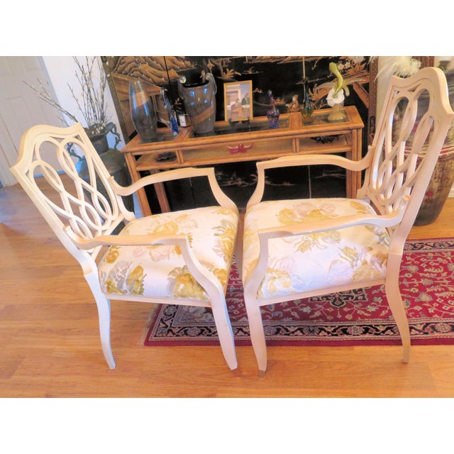 This pair of William Switzer side chair show vintage use consistent with age and year it was created. Minor imperfections...