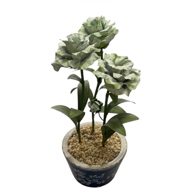 A charming vintage mid-century tôle peinte (painted tin) floral topiary centerpiece featuring three beautifully...
