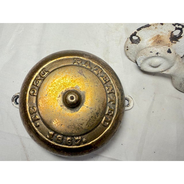 This rare antique brass hand winding front door bell from the 19th century is a stunning piece of hardware with a touch of...