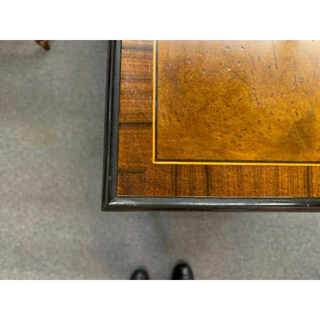 Awesome shelf unit on casters with storage drawer in the bottom. This burled wood triple shelf unit has black trim and...