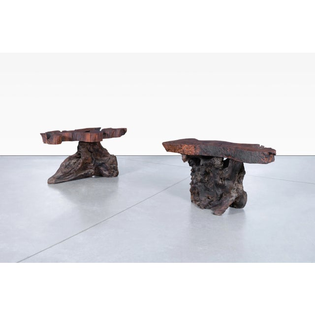 Vintage live edge redwood burl side tables crafted in the United States during the 1960s. Sculpted from massive sections...