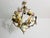 This stunning chandelier from 1970s germany showcases a beautiful floral design that epitomizes the elegance of the...