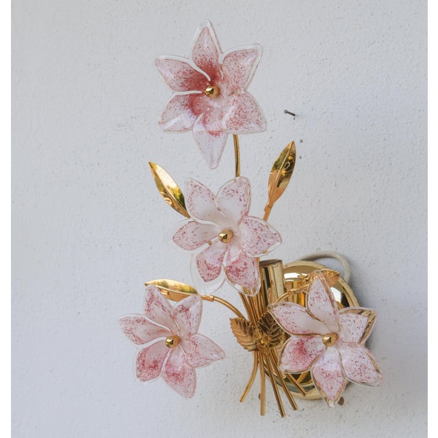 Pretty pair of wall light with Murano glass pink flowers. Accommodates one E14 screw-in bulbs, European standards,...