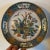 Pair antique 19th century Chinese export porcelain famille rose plates decorated with vases and precious objects. Measure...