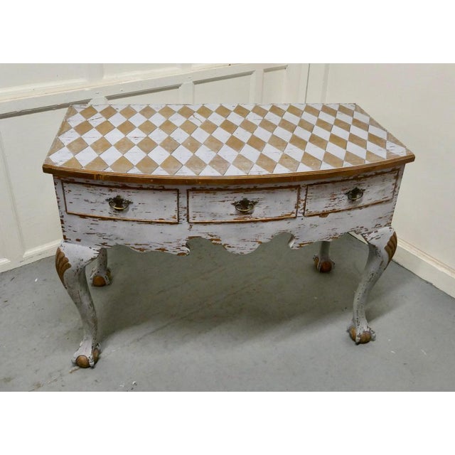 Georgian Baroque bow front painted console side table. A unique piece, the table dated from circa 1800, it is decorated in...